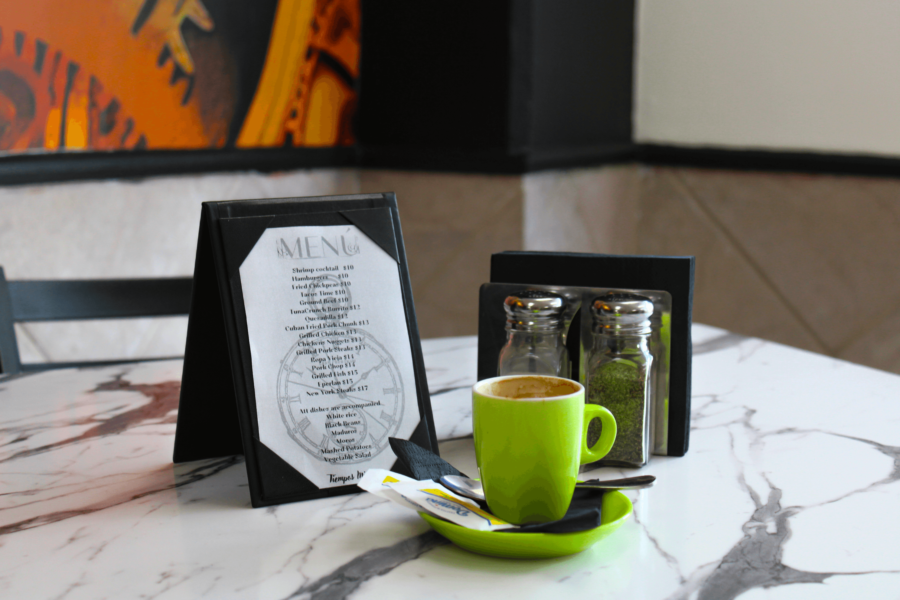 Restaurant interior with warm lighting and Cuban decor